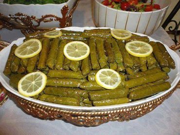 آماده‌سازی برگ‌ها و پخت دلمه